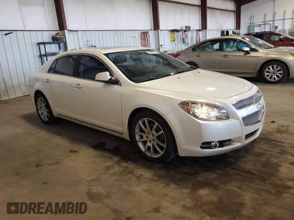 2011 Chevrolet Malibu LTZ with VIN 1G1ZE5E10BF185442, listed as a Copart auction lot 80897835 with 112,488 mi miles and Salvage title. Bid and sale history available at DreamBid. Image 4.