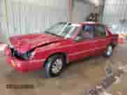 1991 Dodge Spirit with VIN 1B3XA46K7MF556659, listed as a Copart auction lot 63274095 with 107,254 mi miles and Salvage title. Bid and sale history available at DreamBid. Image 1.