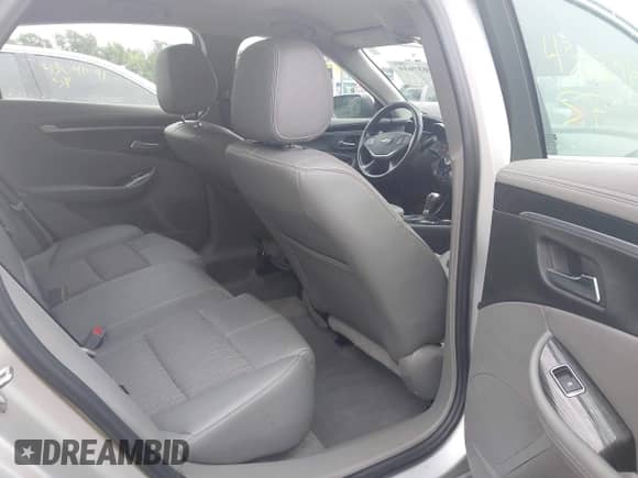 2018 Chevrolet Impala LT with VIN 2G1105S34J9108310, listed as a IAAI auction lot 43037616 with 113,873 mi miles and . Bid and sale history available at DreamBid. Image 8.