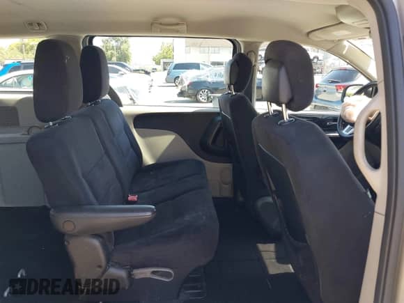 2014 Dodge Grand Caravan SE with VIN 2C4RDGBG2ER316379, listed as a IAAI auction lot 42531072 with 140,095 mi miles and . Bid and sale history available at DreamBid. Image 8.