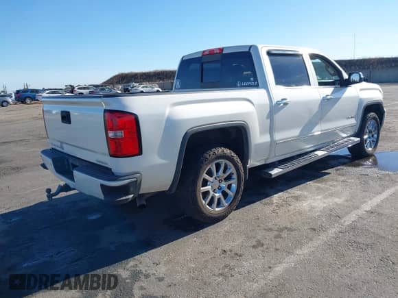 2014 GMC Sierra 1500 Denali with VIN 3GTU2WEJ6EG399287, listed as a IAAI auction lot 42931677 with 206,636 mi miles and . Bid and sale history available at DreamBid. Image 4.