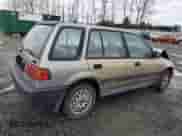 1990 Honda Civic with VIN JHMEE2754LS010638, listed as a Copart auction lot 85169464 with 167,566 mi miles and Salvage title. Bid and sale history available at DreamBid. Image 3.