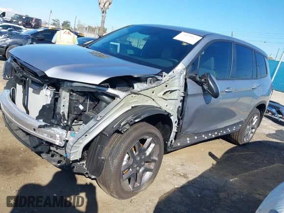 2023 Honda Passport EX-L with VIN 5FNYF8H50PB036640, listed as a IAAI auction lot 42536022 with 1,658 mi miles and . Bid and sale history available at DreamBid. Image 2.