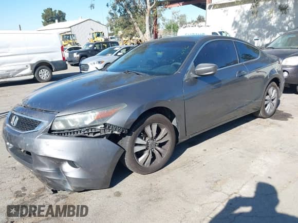 2009 Honda Accord LX-S with VIN 1HGCS12389A018632, listed as a IAAI auction lot 42227014 with 149,645 mi miles and . Bid and sale history available at DreamBid. Image 2.