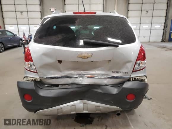 2012 Chevrolet Captiva Sport LS with VIN 3GNAL2EK4CS591729, listed as a Copart auction lot 77488834 with 182,738 mi miles and Salvage title. Bid and sale history available at DreamBid. Image 6.