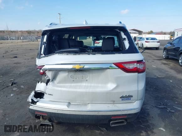 2021 Chevrolet Traverse High Country z VIN 1GNEVNKW9MJ200257, wystawiony jako IAAI lot #41545240 z przebiegiem 72 842 mil mil oraz . Historia ofert i sprzedaży dostępna na DreamBid. Obrazek 16.