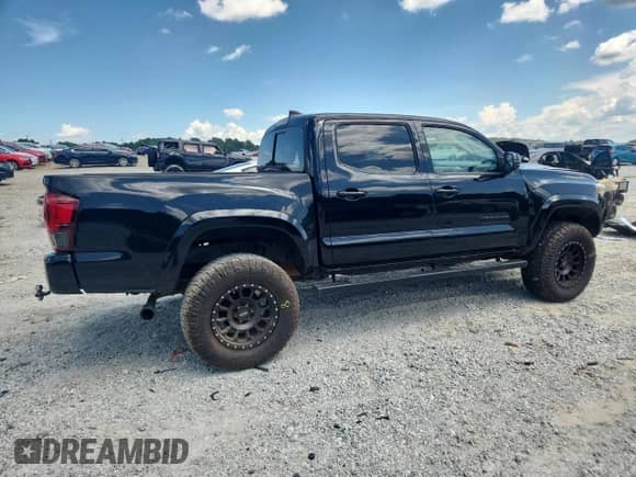2018 Toyota Tacoma SR5 с VIN 3TMAZ5CN5JM073281, выставлен на аукционе Copart как лот 66610845 с пробегом 82 329 миль миль и Списание • Salvage title. История ставок и продаж доступна на DreamBid. Изображение 3.