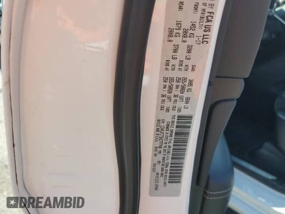 2017 Jeep Grand Cherokee Overland with VIN 1C4RJFCT5HC777748, listed as a Copart auction lot 63121635 with 106,991 mi miles and Salvage title. Bid and sale history available at DreamBid. Image 13.