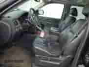 2010 Chevrolet Tahoe LTZ с VIN 1GNUKCE03AR279891, выставлен на аукционе Copart как лот 59116705 с пробегом 284 851 миль миль и Чистый • Clean title. История ставок и продаж доступна на DreamBid. Изображение 7.