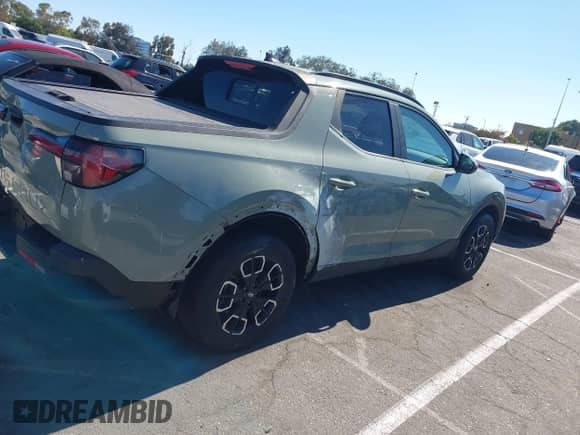 2022 Hyundai Santa Cruz SEL Premium с VIN 5NTJDDAF9NH005762, выставлен на аукционе IAAI как лот 42587584 с пробегом 35 779 миль миль и . История ставок и продаж доступна на DreamBid. Изображение 13.