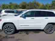 2018 Jeep Grand Cherokee Overland with VIN 1C4RJFCG7JC324708, listed as a IAAI auction lot 43294688 with 131,457 mi miles and . Bid and sale history available at DreamBid. Image 14.