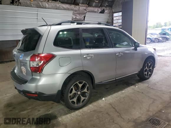 2015 Subaru Forester XT Touring with VIN JF2SJGWC2FH533074, listed as a Copart auction lot 69622555 with 71,732 mi miles and Salvage title. Bid and sale history available at DreamBid. Image 3.