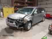 2014 Dodge Grand Caravan SXT with VIN 2C4RDGCGXER263963, listed as a IAAI auction lot 41956264 with 138,815 mi miles and . Bid and sale history available at DreamBid. Image 2.