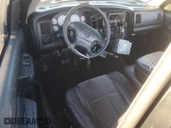 2003 Dodge 1500 ST with VIN 1D7HA16D73J666258, listed as a Copart auction lot 88913815 with 188,452 mi miles and Salvage title. Bid and sale history available at DreamBid. Image 8.