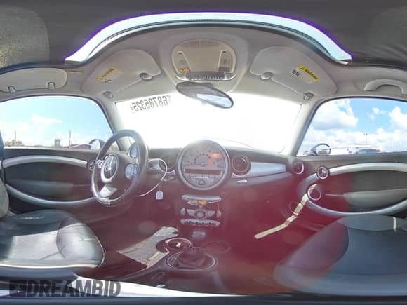 2007 MINI Hardtop with VIN WMWMF33597TT56851, listed as a Copart auction lot 68785325 with 140,683 mi miles and Salvage title. Bid and sale history available at DreamBid. Image 14.