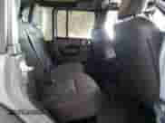 2022 Jeep Wrangler Unlimited High Tide z VIN 1C4HJXDG2NW221829, wystawiony jako Copart lot #64836074 z przebiegiem 3 394 mil mil oraz Szkoda całkowita • Salvage title. Historia ofert i sprzedaży dostępna na DreamBid. Obrazek 10.