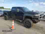 2013 Chevrolet Silverado 2500HD LT z VIN 1GC1KXC81DF145768, wystawiony jako Copart lot #69955635 z przebiegiem 201 623 mil mil oraz Szkoda całkowita • Salvage title. Historia ofert i sprzedaży dostępna na DreamBid. Obrazek 4.