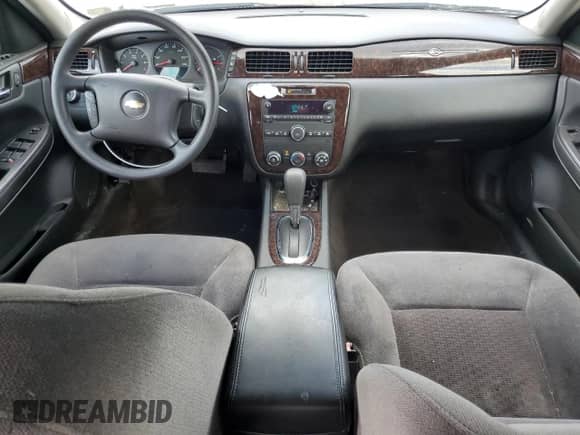 2014 Chevrolet Impala LS z VIN 2G1WA5E33E1141740, wystawiony jako Copart lot #63278725 z przebiegiem 149 083 mil mil oraz Szkoda całkowita • Salvage title. Historia ofert i sprzedaży dostępna na DreamBid. Obrazek 8.