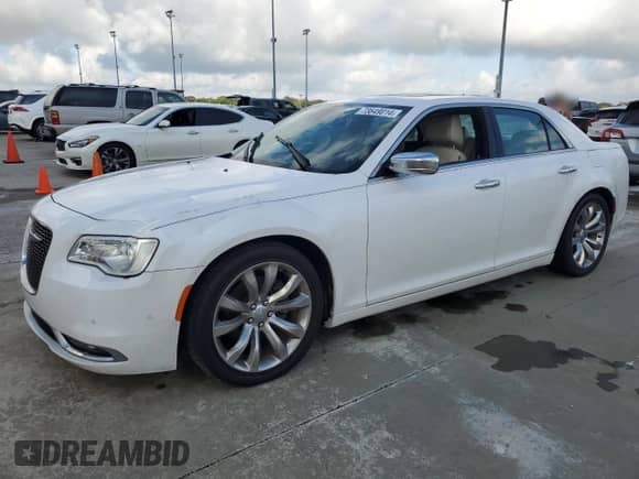 2015 Chrysler 300 C с VIN 2C3CCAET3FH830414, выставлен на аукционе Copart как лот 73649014 с пробегом Не указан миль и Списание • Salvage title. История ставок и продаж доступна на DreamBid. Изображение 1.