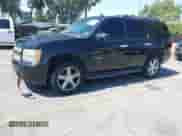 2009 Chevrolet Tahoe 2LT with VIN 1GNFC23059R295332, listed as a IAAI auction lot 42679966 with 223,678 mi miles and . Bid and sale history available at DreamBid. Image 2.