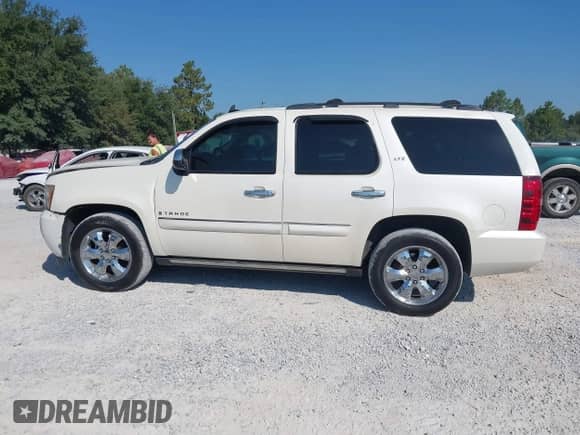 2008 Chevrolet Tahoe 1LT z VIN 1GNFC13038R211436, wystawiony jako IAAI lot #43239679 z przebiegiem 218 677 mil mil oraz . Historia ofert i sprzedaży dostępna na DreamBid. Obrazek 14.