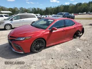 2023 Toyota Camry Hybrid XSE с VIN 4T1K31AK9PU055647, выставлен на аукционе Copart как лот 85590585 с пробегом 23 200 миль миль и Списание • Salvage title. История ставок и продаж доступна на DreamBid. Изображение 1.