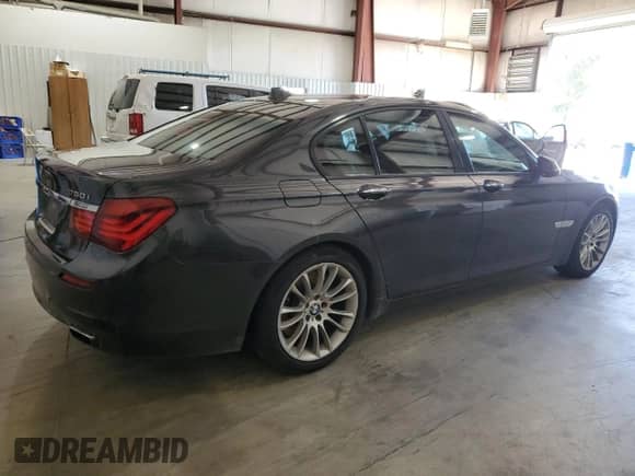 2015 BMW 7 Series 750i with VIN WBAYA8C50FD825699, listed as a Copart auction lot 87101895 with 130,651 mi miles and Clean title. Bid and sale history available at DreamBid. Image 3.