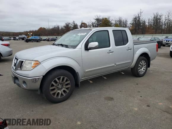 2011 Nissan Frontier Pro-4X z VIN 1N6AD0EVXBC416696, wystawiony jako Copart lot #90623765 z przebiegiem 161 124 mil mil oraz Szkoda całkowita • Salvage title. Historia ofert i sprzedaży dostępna na DreamBid. Obrazek 1.