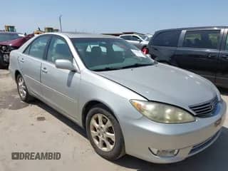 2005 Toyota Camry LE with VIN 4T1BF30K25U606910, listed as a IAAI auction lot 42322892 with 144,835 mi miles and . Bid and sale history available at DreamBid. Image 1.