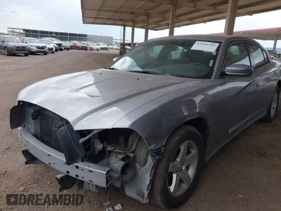 2014 Dodge Charger SE with VIN 2C3CDXBG9EH309140, listed as a IAAI auction lot 43261326 with 105,373 mi miles and . Bid and sale history available at DreamBid. Image 17.
