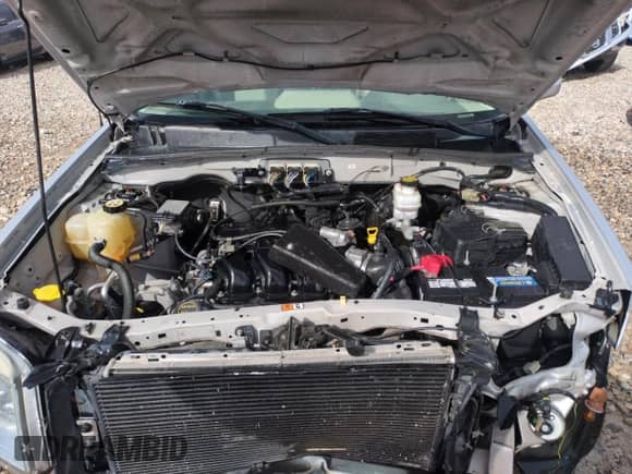 2008 Mercury Mariner Premier with VIN 4M2CU97148KJ02416, listed as a Copart auction lot 51703285 with 75,124 mi miles and Salvage title. Bid and sale history available at DreamBid. Image 11.