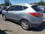 2010 Hyundai Tucson Limited with VIN KM8JU3ACXAU109218, listed as a Copart auction lot 66762565 with 150,241 mi miles and Salvage title. Bid and sale history available at DreamBid. Image 2.