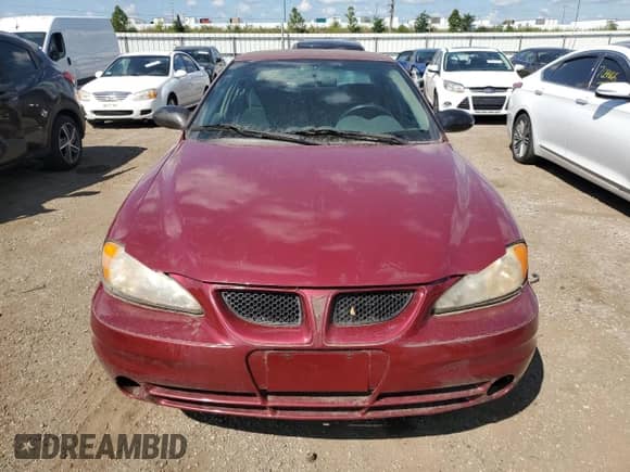 2004 Pontiac Grand Am SE z VIN 1G2NE52F84M635749, wystawiony jako Copart lot #70884285 z przebiegiem 61 932 mil mil oraz Czysty tytuł • Clean title. Historia ofert i sprzedaży dostępna na DreamBid. Obrazek 5.