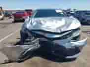 2021 Toyota Camry Hybrid XLE with VIN 4T1F31AK2MU547062, listed as a IAAI auction lot 42405027 with 170,899 mi miles and . Bid and sale history available at DreamBid. Image 12.