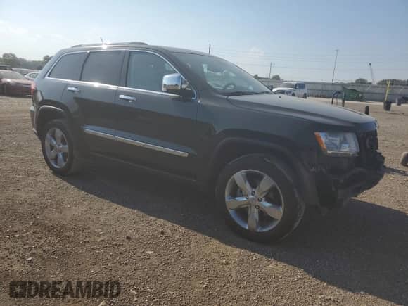 2013 Jeep Grand Cherokee Limited с VIN 1C4RJFBG1DC606896, выставлен на аукционе Copart как лот 85170145 с пробегом 143 154 миль миль и Списание • Salvage title. История ставок и продаж доступна на DreamBid. Изображение 4.