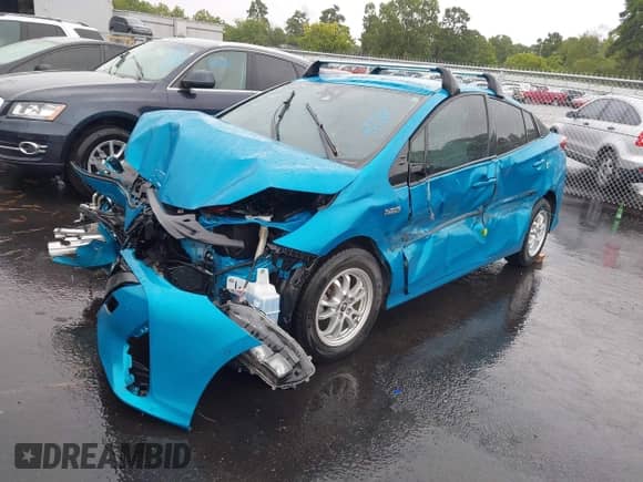 2018 Toyota Prius Plus z VIN JTDKARFP7J3070223, wystawiony jako IAAI lot #42922283 z przebiegiem 65 134 mil mil oraz . Historia ofert i sprzedaży dostępna na DreamBid. Obrazek 21.