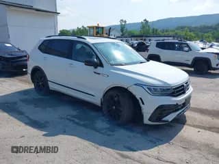 2022 Volkswagen Tiguan SE R-Line Black z VIN 3VV8B7AX0NM007523, wystawiony jako IAAI lot #42457688 z przebiegiem 39 084 mil mil oraz . Historia ofert i sprzedaży dostępna na DreamBid. Obrazek 1.