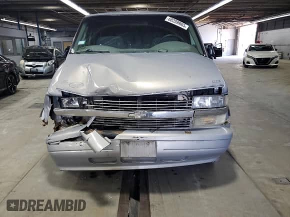 2000 Chevrolet Astro Cargo YF7 with VIN 1GBDM19WXYB162595, listed as a Copart auction lot 60209965 with Not provided miles and Salvage title. Bid and sale history available at DreamBid. Image 5.