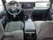 2024 Jeep Wrangler Sport S with VIN 1C4PJXDNXRW349946, listed as a Copart auction lot 56701185 with 6,310 mi miles and Salvage title. Bid and sale history available at DreamBid. Image 8.