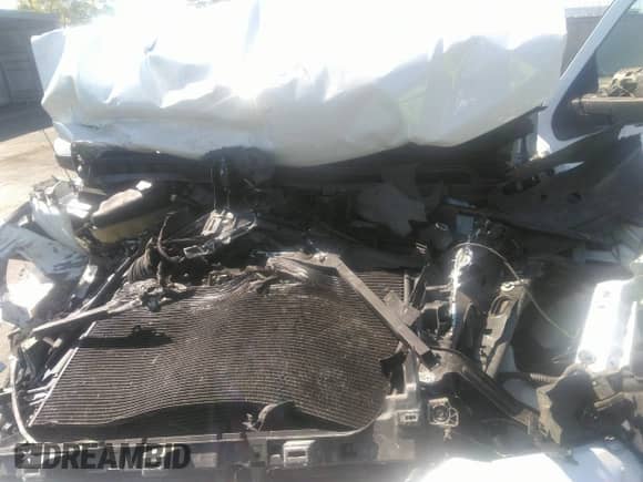 2016 Chevrolet Silverado 1500 LT z VIN 3GCUKREC5GG191603, wystawiony jako IAAI lot #34016468 z przebiegiem Nie podano mil oraz . Historia ofert i sprzedaży dostępna na DreamBid. Obrazek 10.