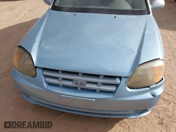 2005 Hyundai Accent GLS z VIN KMHCG35C35U361960, wystawiony jako IAAI lot #43243568 z przebiegiem 163 217 mil mil oraz . Historia ofert i sprzedaży dostępna na DreamBid. Obrazek 6.