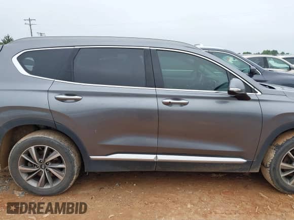 2019 Hyundai Santa Fe Limited with VIN 5NMS53AD9KH001597, listed as a IAAI auction lot 42372116 with 120,336 mi miles and . Bid and sale history available at DreamBid. Image 13.