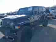 2021 Jeep Wrangler Unlimited Sahara z VIN 1C4HJXEG5MW595929, wystawiony jako IAAI lot #41379250 z przebiegiem 63 537 mil mil oraz . Historia ofert i sprzedaży dostępna na DreamBid. Obrazek 17.