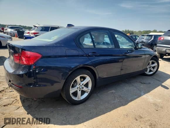 2014 BMW 3 Series 328i xDrive with VIN WBA3B3C51EJ981034, listed as a Copart auction lot 71869695 with 160,025 mi miles and Salvage title. Bid and sale history available at DreamBid. Image 3.