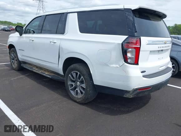 2024 Chevrolet Suburban LS with VIN 1GNSKBKD7RR153232, listed as a IAAI auction lot 42070157 with 10,053 mi miles and . Bid and sale history available at DreamBid. Image 3.
