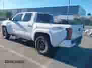 2024 Toyota Tacoma SR5 with VIN 3TMLB5JN8RM034034, listed as a IAAI auction lot 41253779 with 21,448 mi miles and . Bid and sale history available at DreamBid. Image 3.