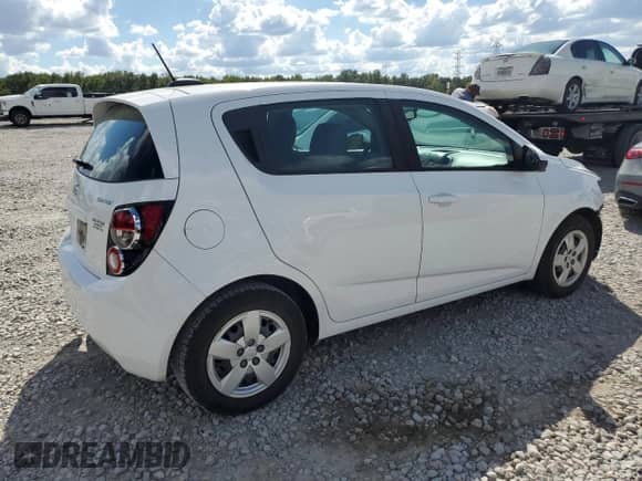 2016 Chevrolet Sonic LS с VIN 1G1JA6SH3G4172154, выставлен на аукционе Copart как лот 82002125 с пробегом 76 069 миль миль и Списание • Salvage title. История ставок и продаж доступна на DreamBid. Изображение 3.