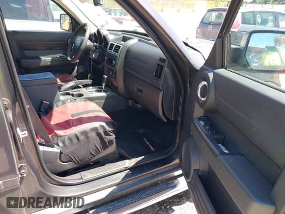 2011 Dodge Nitro Heat with VIN 1D4PU4GX9BW506698, listed as a IAAI auction lot 42690394 with 159,687 mi miles and . Bid and sale history available at DreamBid. Image 5.