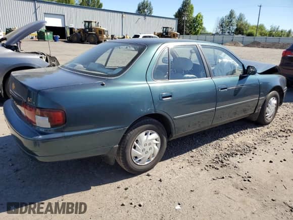 1996 Toyota Camry DX z VIN JT2BG12K5T0391684, wystawiony jako Copart lot #64286055 z przebiegiem 188 010 mil mil oraz Szkoda całkowita • Salvage title. Historia ofert i sprzedaży dostępna na DreamBid. Obrazek 3.