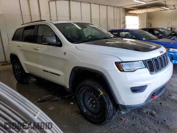 2021 Jeep Grand Cherokee Trailhawk z VIN 1C4RJFLG0MC868410, wystawiony jako Copart lot #63120925 z przebiegiem 140 986 mil mil oraz Czysty tytuł • Clean title. Historia ofert i sprzedaży dostępna na DreamBid. Obrazek 4.
